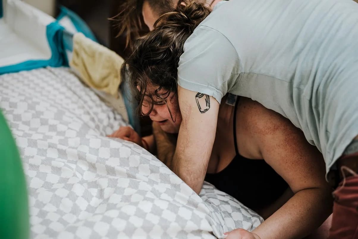 Midwife monitoring mother and baby with gentle expertise