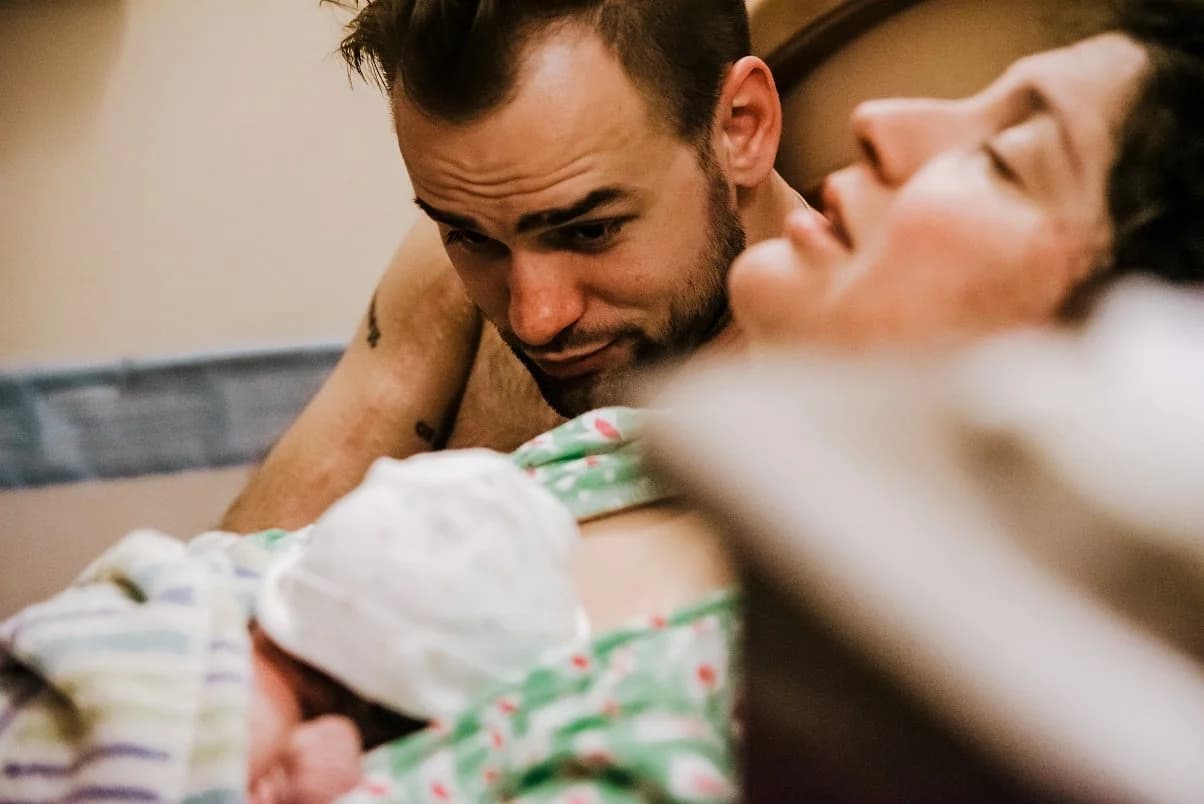 Mother and baby wrapped together in quiet peace