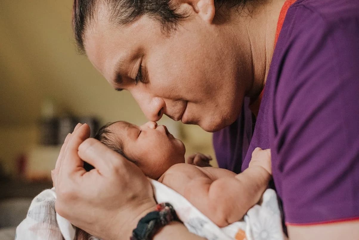 Newborn wrapped and resting in perfect peace