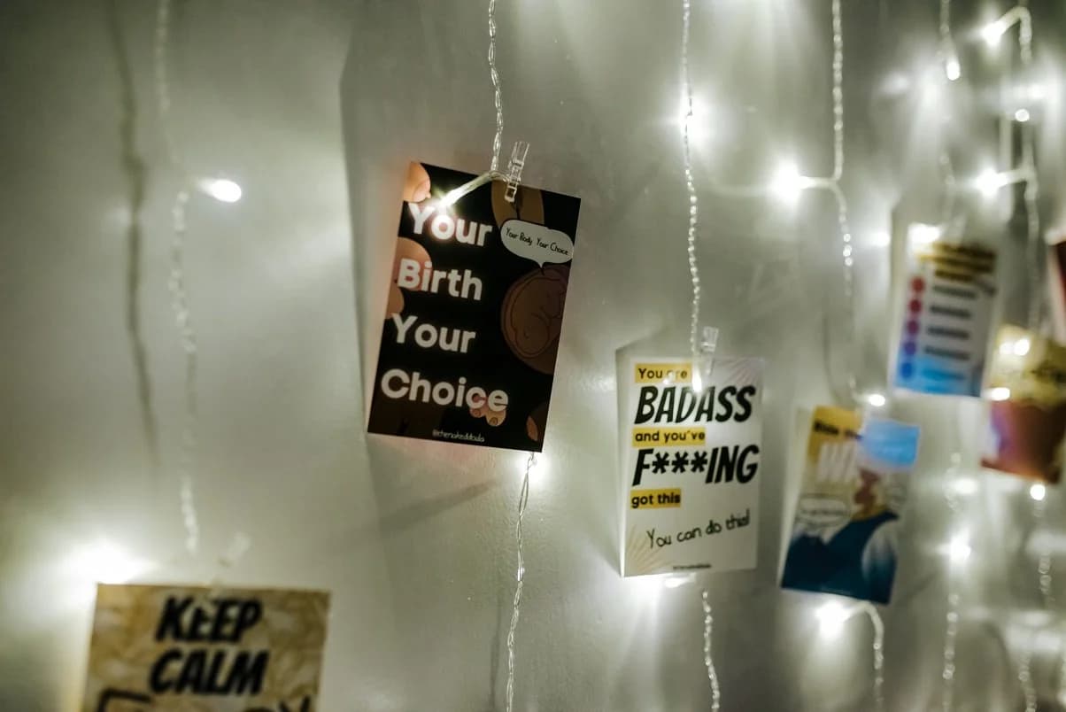 Hands gripping the edge of the bed through a surge