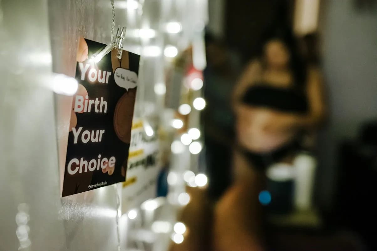 Partner applying counter-pressure with practiced care