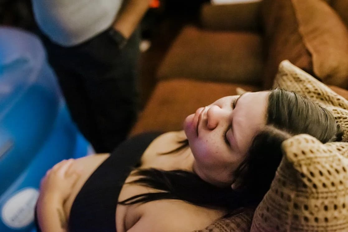 The birth pool filled and ready, steam rising softly