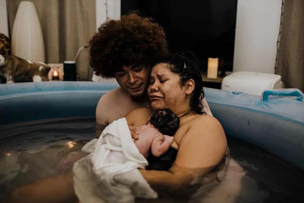 First latch — baby finding the breast instinctively